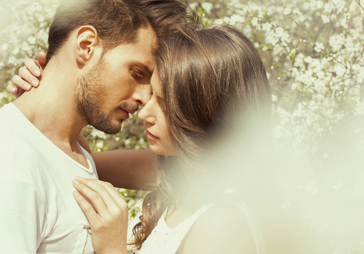 Portrait of kissing couple