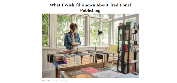 Woman reading the back cover of a book in front of a table stacked with books